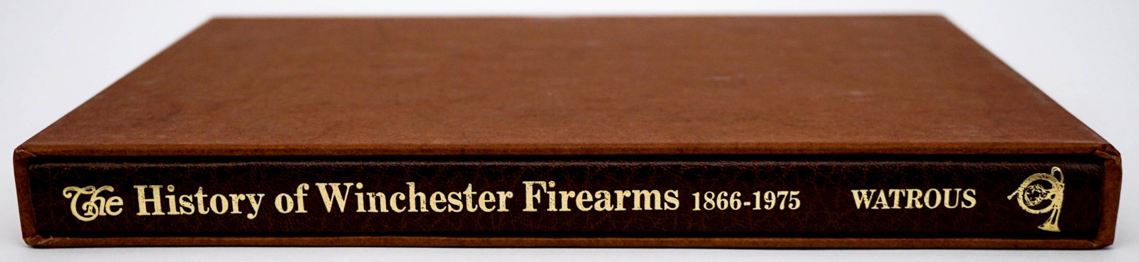Winchester Firearms by Watrous SIGNED 468/1000: The History of Winchester Firearms by George Watrous. Signed and numbered 468 of 1000 copies. 229 pp. with slipcase. Brown leatherette with gilt design and lettering. Measures 11.25 in. x 8.5 in. x 1 