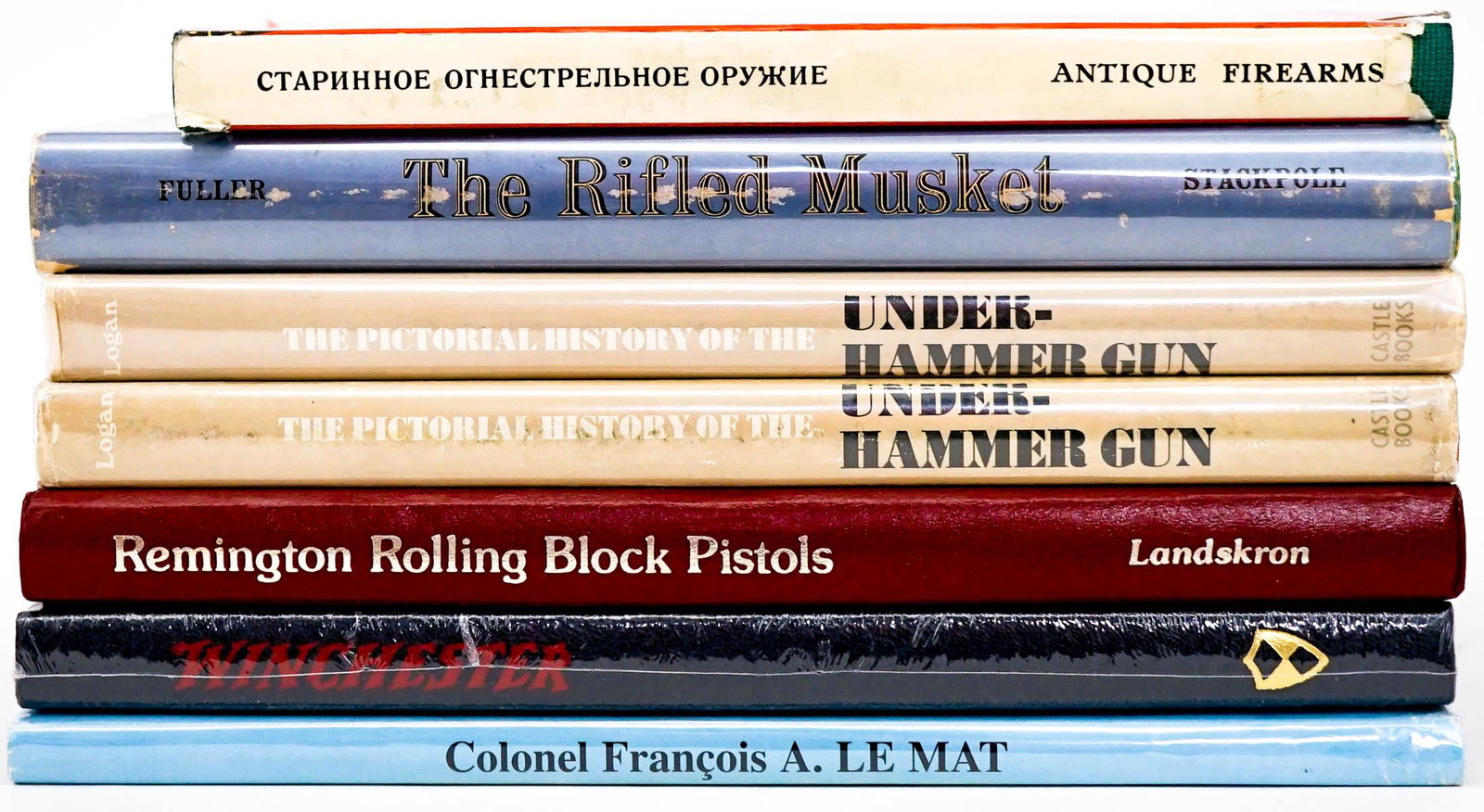 Firearms (7) Books: Seven (7) firearm books. Includes: Winchester (sealed); The Rifled Musket; Pictorial History of the Under-Hammer; and more. Lot measures 11.5 in. x 9 in. x 6 in. Provenance: Bob Borcherdt collection B