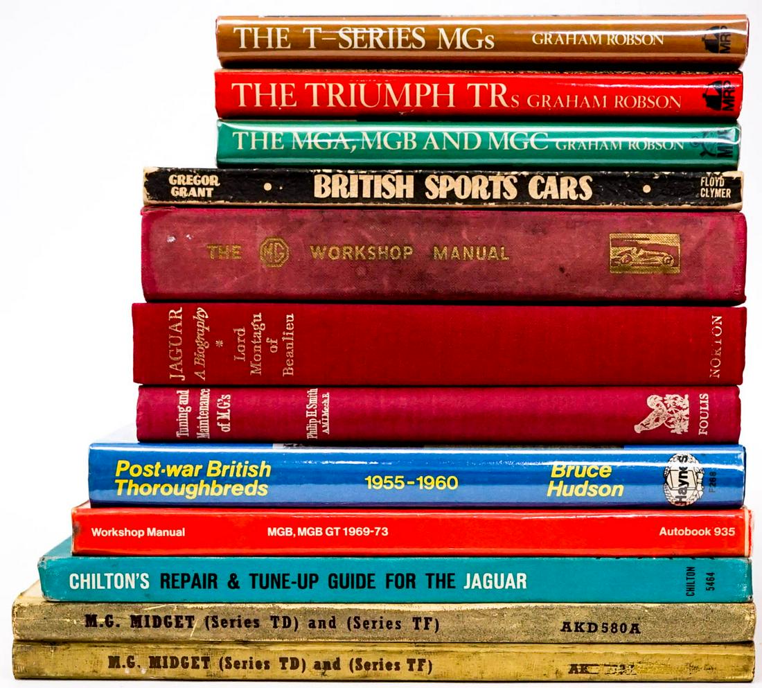 British (12 Sport Car Books and Manuals [MG]: Twelve (12) books and manuals of British Cars. MG; MGB; Jaguar; Triumph. Lot measures 10 in. x 10 in. x 10 in. Provenance: Bob Borcherdt collection Boulder City, Nevada. If lot is absent of a conditio