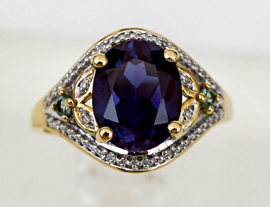 Ladies 10k Gold Ring with Red/Purple Stone (1 of 9)