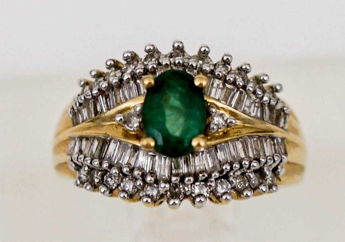 Ladies 10k Gold Emerald Ring with Diamonds: Ladies 10k yellow gold Emerald ring with diamonds. Ring measures 7 mm x 5 mm (1.14) and ring weighs 5.9 grams. Ring size 7. Payment by wire transfer only. This is an estate sale. All information given