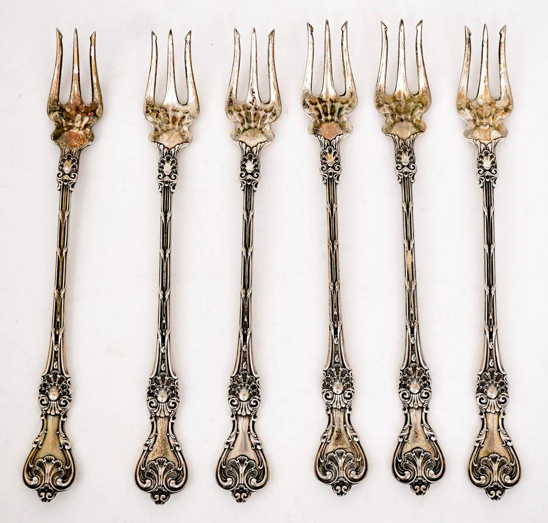 (6) Whiting King Edward Sterling Cocktail Forks: They measure 6.125 inches in length. They weigh 110 grams. No monograms. If lot is absent of a condition report one may be requested via email. Condition report is provided as an opinion only and is n