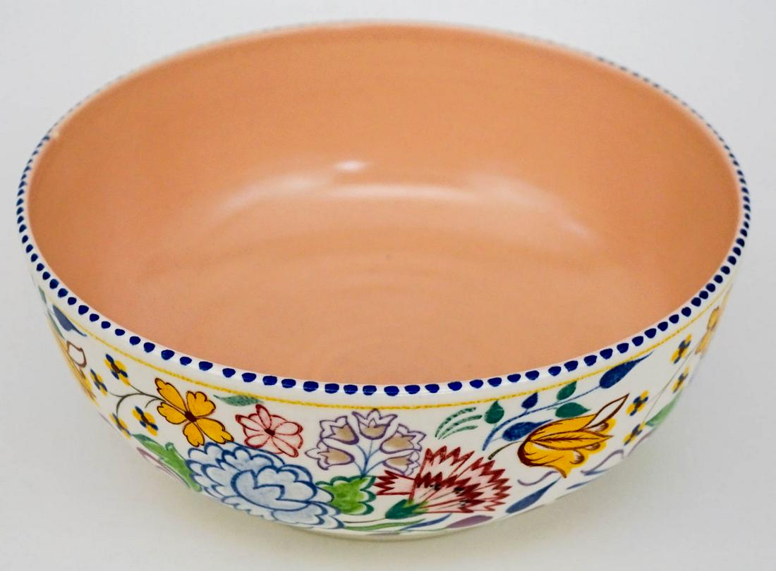 Vintage Poole (England) Pottery Bowl #686: Poole (England) pottery bowl, style #686 measures 9 in. across and 3.75 in. high. Artist initialed. If lot is absent of a condition report one may be requested via email. Condition report is provided