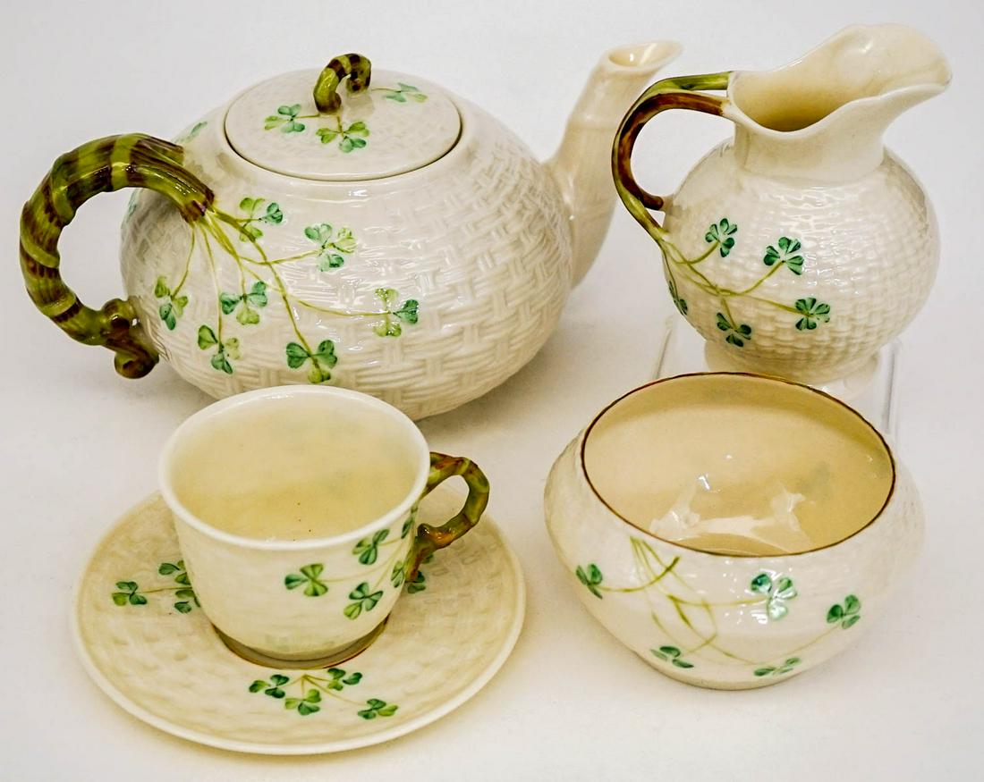 Belleek Shamrock Tea Pot, Cream, Sugar, Cup&Saucer: Belleek Basket Weave Shamrock pattern. Includes: Tea Pot with Lid; measures 4.5 in. tall x 8 in. wide; Cream Pitcher measures 3.5 in. tall x 3.5 in. wide; Sugar Bowl measures 2.125 in. tall x 4 in. wi