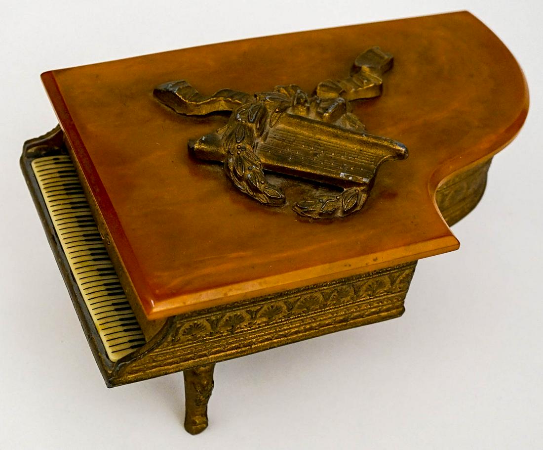 Vintage Grand Piano Music Box Thorens Swiss: Vintage Grand Piano Music Box Thorens Swiss Gold Glit Piano. Measures 4.5-in. x 5.25-in. x 8.5-in. In working order. Excellent condition. If lot is absent of a condition report one may be requested vi