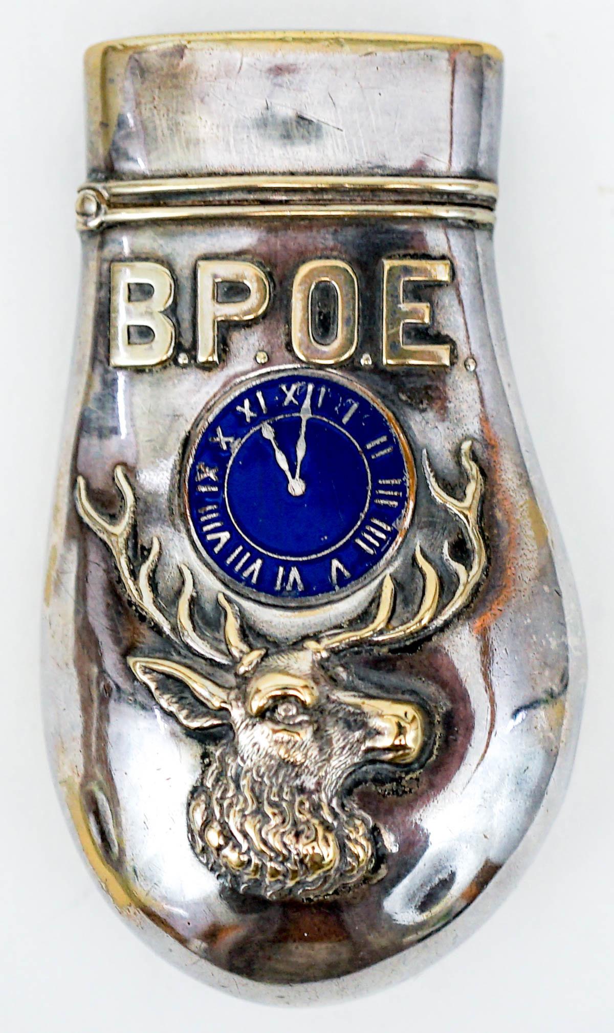 Antique BPOE Germany Silver Plate Match Safe: Antique BPOE Elks Lodge Germany Silver Plate match safe with a blue enamel clock in the shape of an elks tooth. Measures 2.625 in. x 1.5 in. Weighs 21 grams. 'BPOE' The Benevolent and Protective Order
