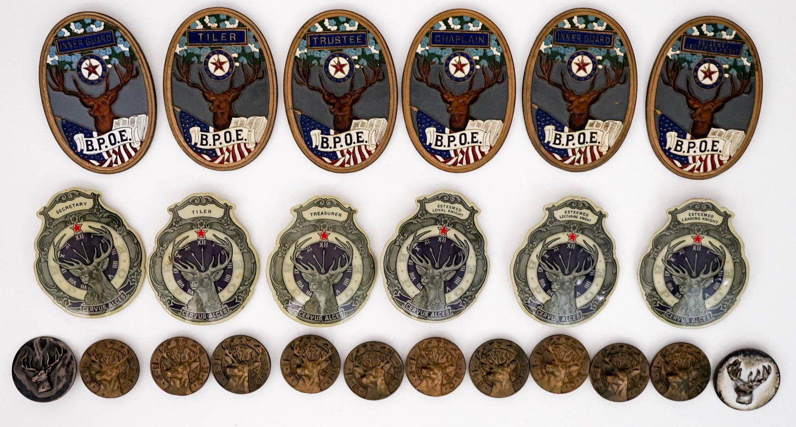 Vintage (24) BPOE Elks Lodge Officer Medals: Twenty-four (24) vintage BPOE Elks Lodge officer medals. Includes: Chaplain; Inner Guard; Trustee; Tiler; Esteemed Lecturing Knight; and others. Measure 1.125 in. - 3 in. long x 1.125 in. - 2 in. wide