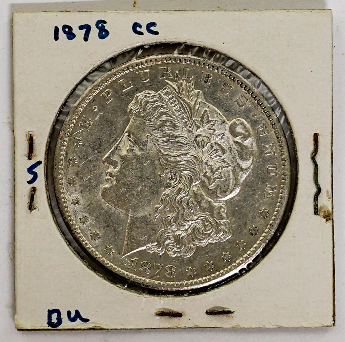 1878-CC Morgan Dollar: 1878-CC Morgan Dollar. Grade on coin holder is not guaranteed as grading can be subjective. Payment by wire transfer only unless pre-approved for alterative form of payment. Please note special biddin