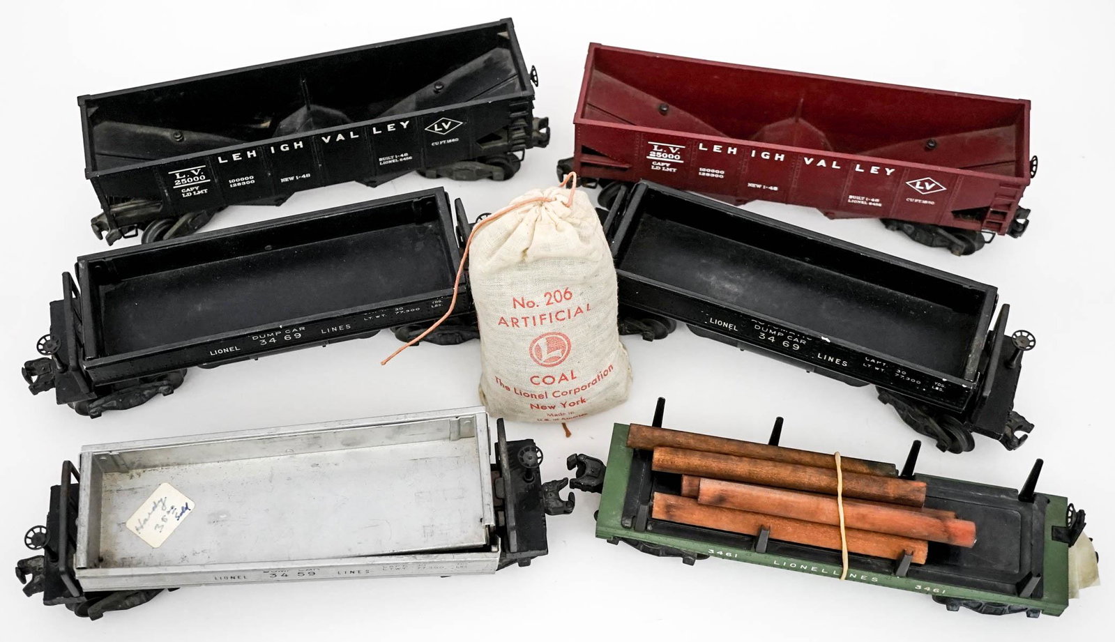 Lionel Trains (6) Rail Cars: Six (6) Lionel Electric Trains (6) rail cars. Includes Lehigh Valley and more. Measure approximately 9 in. long. Weigh 6 lbs. Untested. Provenance: Private estate collection from the Pacific Northwest