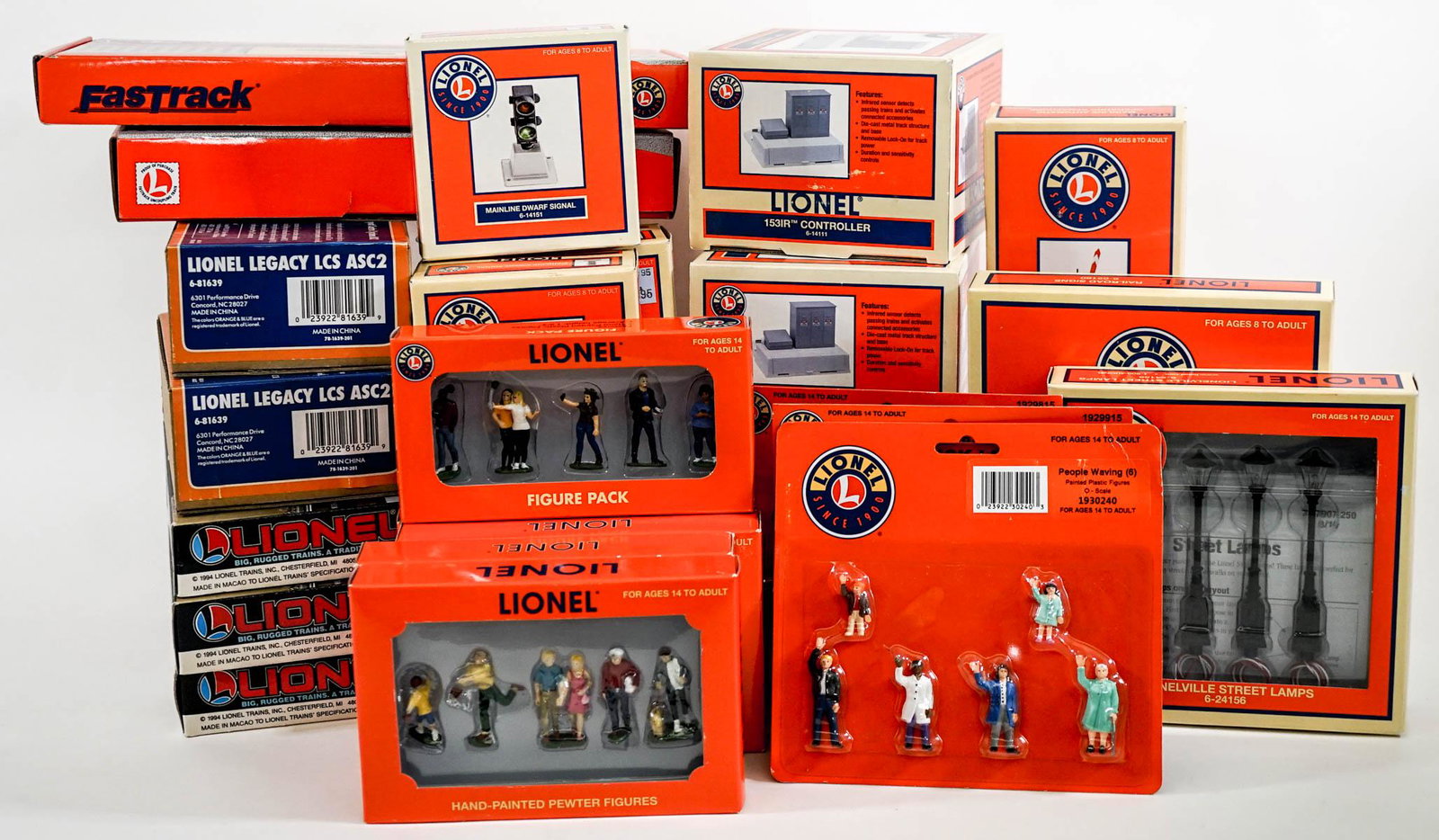 Lionel Accessories (27) Assorted MIB: Twenty-seven (27) Lionel Electric Trains boxed or packaged accessories. Includes Street Lamps, Road Signs, People Packs, Mainline Dwarf Signals, Fast Tracks, Controllers, Operating Highway Lights (not