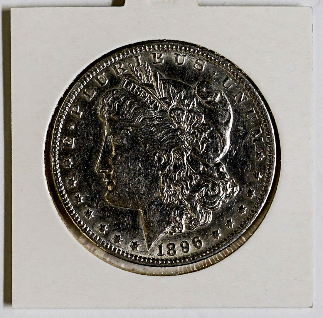 1896-O Morgan Silver Dollar: 1896-O Morgan Silver Dollar. Grade written on card holder is not guaranteed as grading can be subjective. Payment by wire transfer only unless pre-approved for alterative form of payment. Please note 