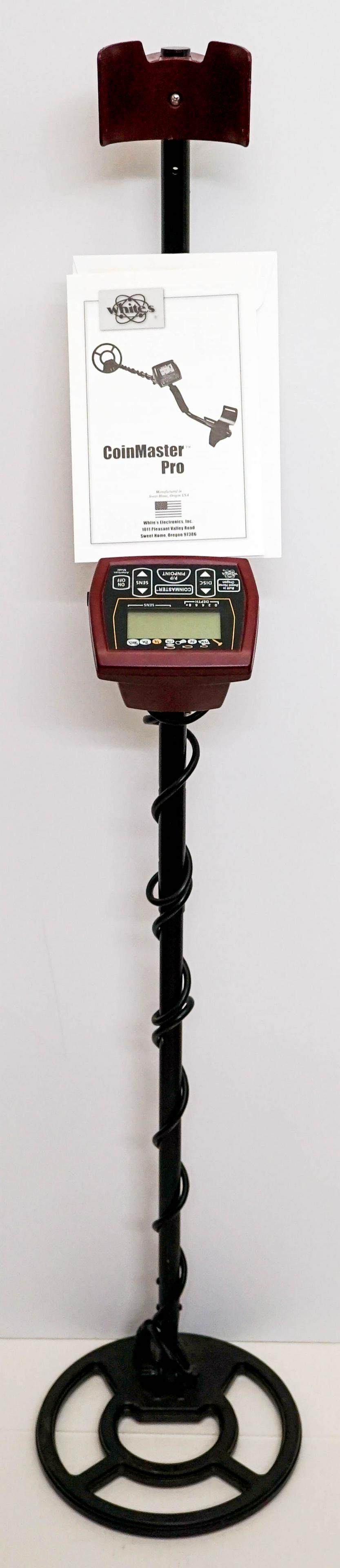 White's Metal Detector Coinmaster: White's Metal Detector Coinmaster 800- 0325 with 9 inch spider loop. Measures approximately 51 in. tall. Appears like new. Weighs 5 lbs. If lot is absent of a condition report one may be requested via