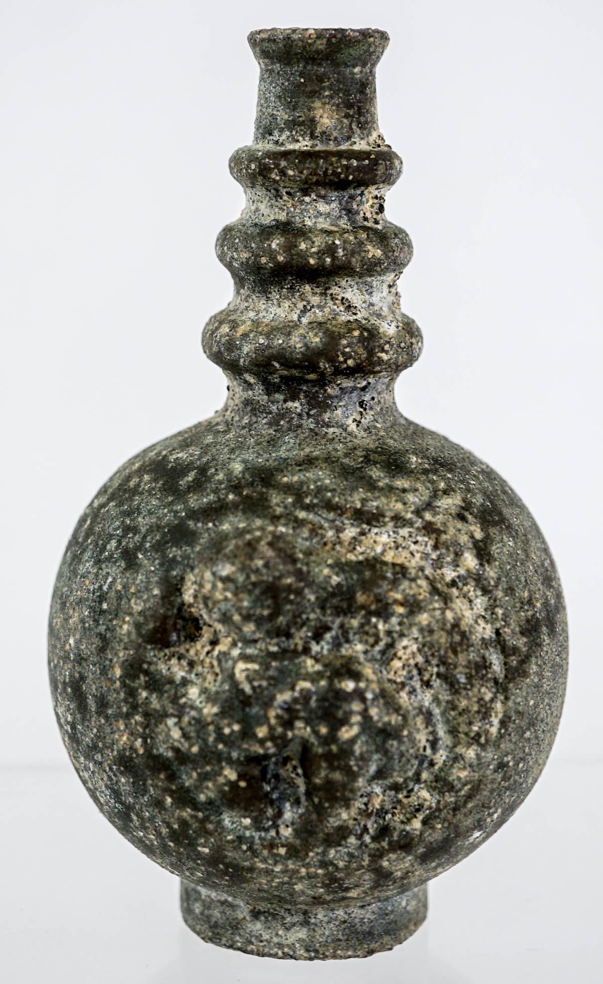 Ancient Carved Stone Vase: Carved Stone Vase. Measures 4.5 x 2.5 inches (11.5cm x 6.5cm). Provenance: Estate of David Milot. David was a Real Estate Broker by trade and a passionate, lifelong collector of anything of quality th