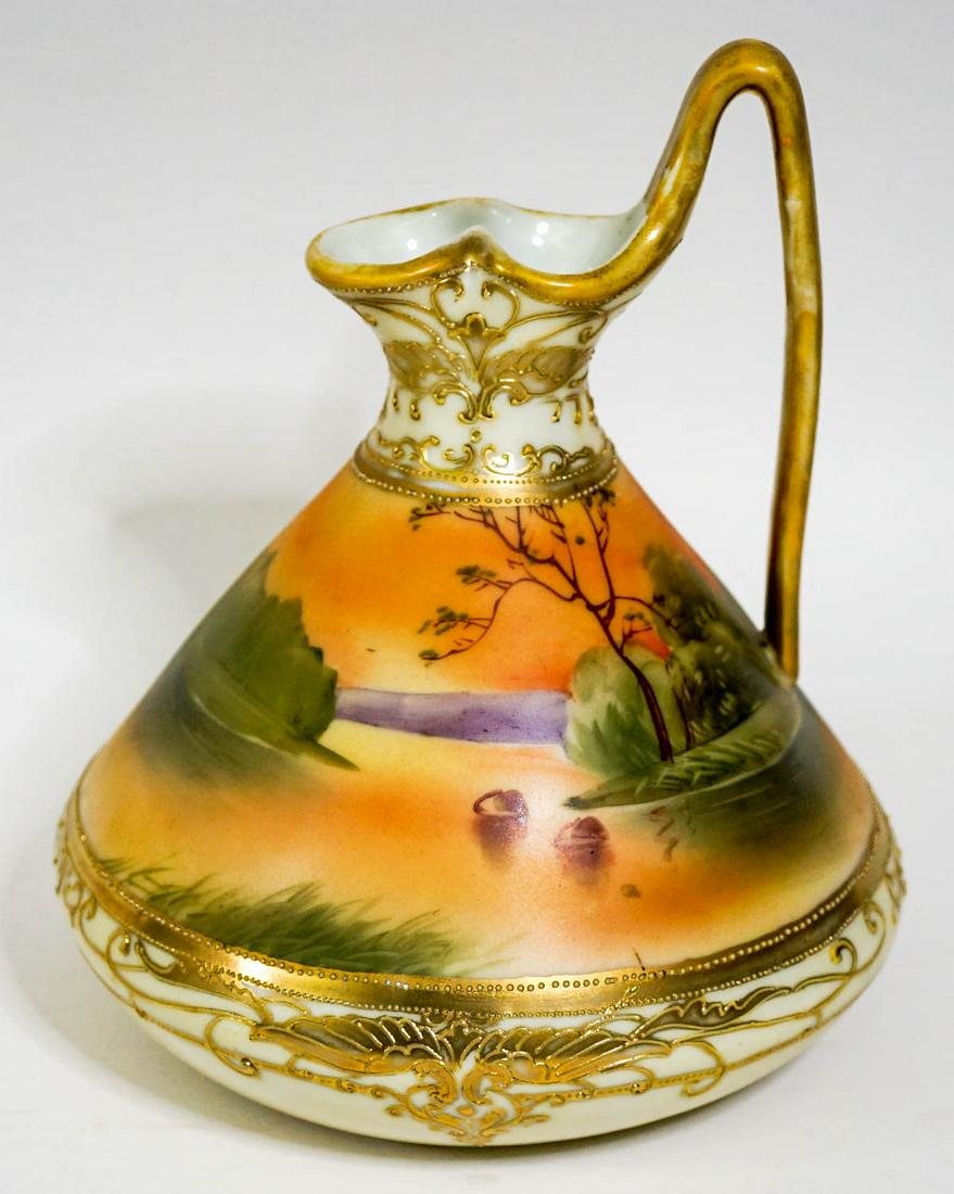A Fine Nippon Ewer: A Fine Nippon Ewer. Measures 7 inches x 6 inches. No damage or repairs. If lot is absent of a condition report one may be requested via email. Condition report is provided as an opinion only and is no
