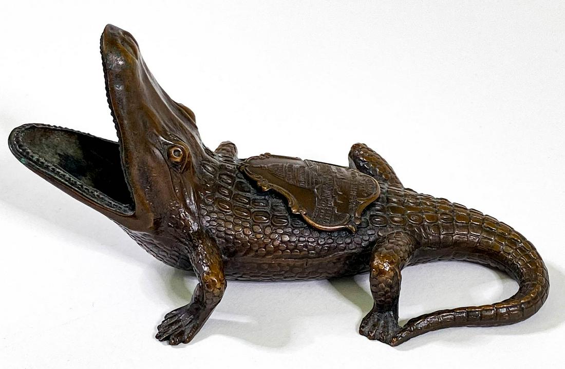 Vintage Jennings Brothers Alligator Cigar Snuffer: [Florida Souvenir Ware, Alligator] Vintage Jennings Brothers Alligator Cigar Snuffer or Ashtray with Florida souvenir ware medallion on back. Marked JB for Jennings Brothers, copper clad base metal. M