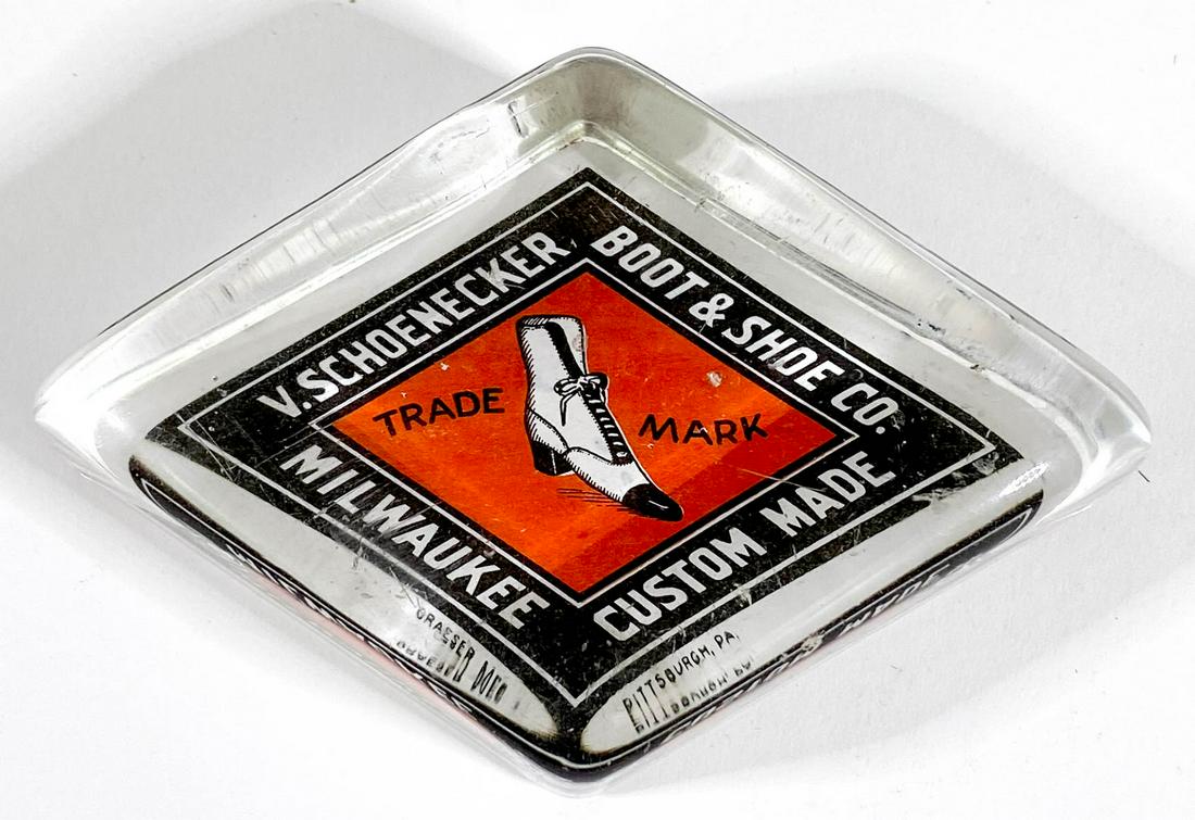 V. Schoenecker Boot & Shoe (Milwaukee, Wisconsin): V. Schoenecker Boot & Shoe (Milwaukee, Wisconsin) Antique Advertising Glass Paperweight by Albert Graeser, Pittsburgh, Pa. Measures 1 x 4 x 2.5 inches. Excellent condition. Provenance: Private collect