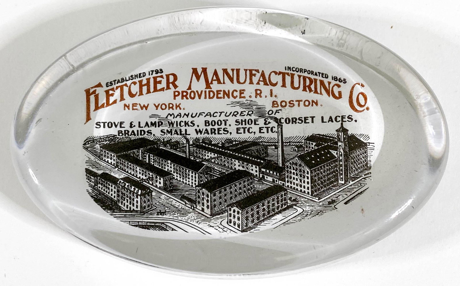 [Boots, Shoes, Manufacturing] Fletcher Mfg. Co.: [Boots, Shoes, Manufacturing] Fletcher Mfg. Co., Providence, Rhode Island Antique Advertising Glass Paperweight. Measures .875 x 4.375 x 2.75 inches. Excellent condition. Provenance: Private collectio
