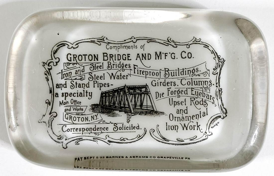 Groton Bridge and Mfg. Co. (Groton, New York): Groton Bridge and Mfg. Co. (Groton, New York) Antique Advertising Glass Paperweight by Barnes and Abrams, Grapeville, Pa. Measures 1 x 4 x 2.5 inches. Very good to excellent condition with light surfa
