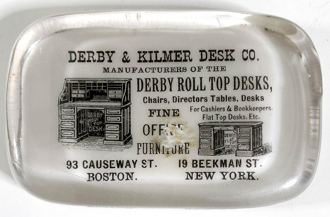 Derby & Kilmer Roll Top Desks Adv. Paperweight: Derby & Kilmer Roll Top Desks Antique Glass Advertising Paperweight by Barnes & Abrams, Syracuse, New York. Measures .875 x 4 x 2.5 inches. Fair to good condition with image loss repaired. Provenance: