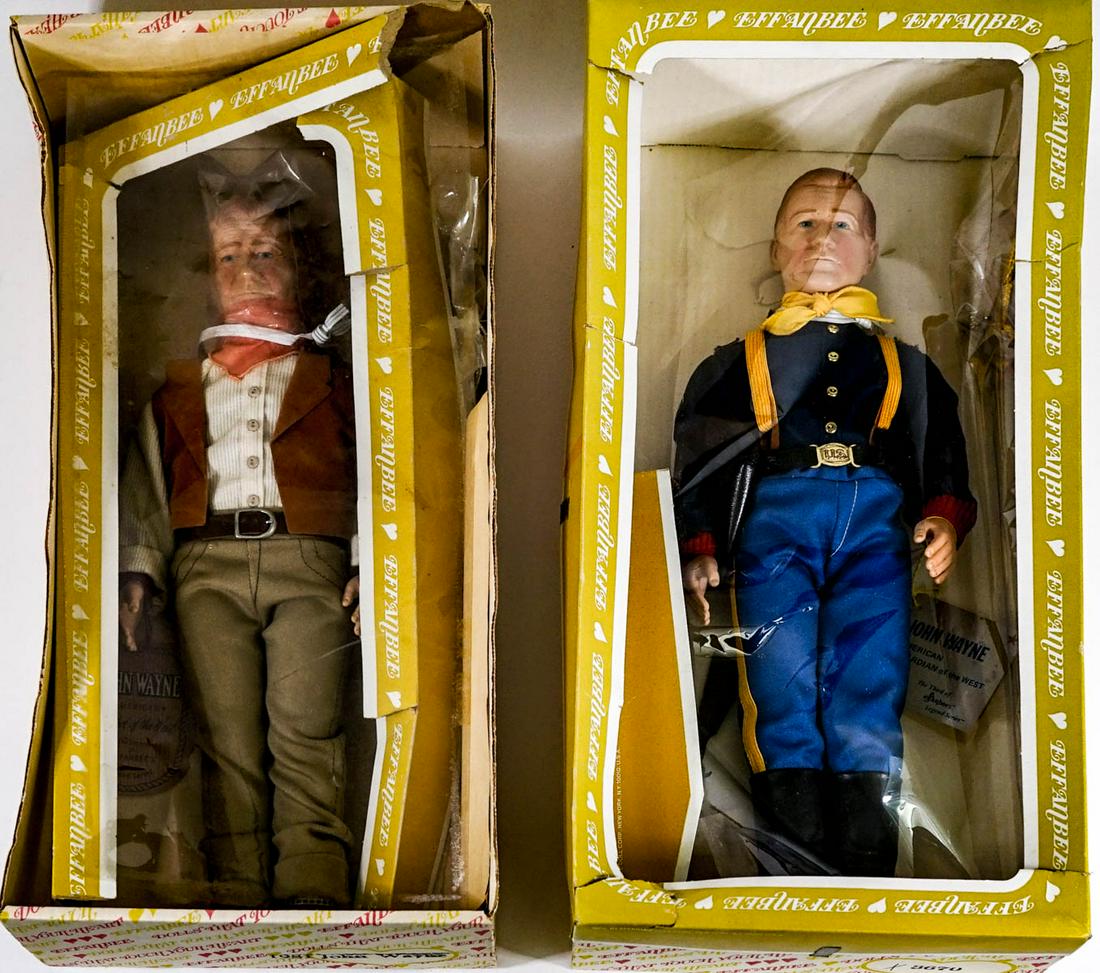John Wayne (2) Vintage Effanbee 18 IN Dolls: Two (2) John Wayne vintage Effanbee 18 inch dolls. Original boxes are torn and worn. The dolls appear to have never been removed from boxes. No evidence of damage or repairs. If lot is absent of a con
