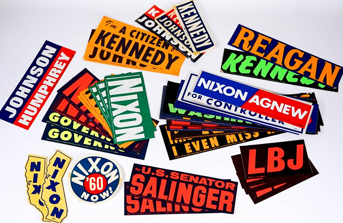 Vintage (32) Political Signs / Stickers: Thirty-two (32) political signs, stickers and bumper stickers. Includes: Kennedy, Reagan, Johnson, Nixon. Lot measures 15 in. x 5 in. x .5 in. If lot is absent of a condition report one may be request