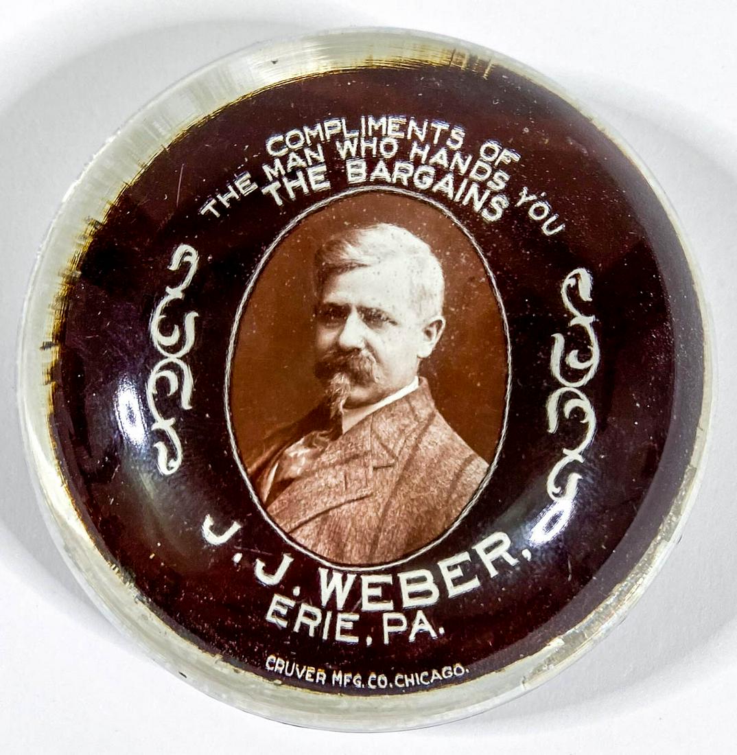 J.J. Weber (Erie, Pennsylvania) Paperweight: J.J. Weber (Erie, Pennsylvania) Antique Glass Advertising Paperweight. Measures 3 inches diameter. Excellent condition. If lot is absent of a condition report one may be requested via email. Condition