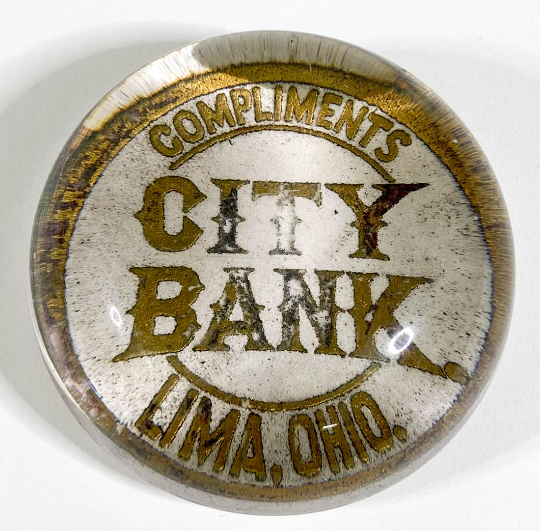 City Bank (Lima, Ohio) Antique Paperweight: City Bank (Lima, Ohio) Antique Advertising Glass Dome Paperweight. Measures 1.375 x 3 inches. Good condition with gold gilt loss, no chips or damage. Provenance: Private collection Washington state. I