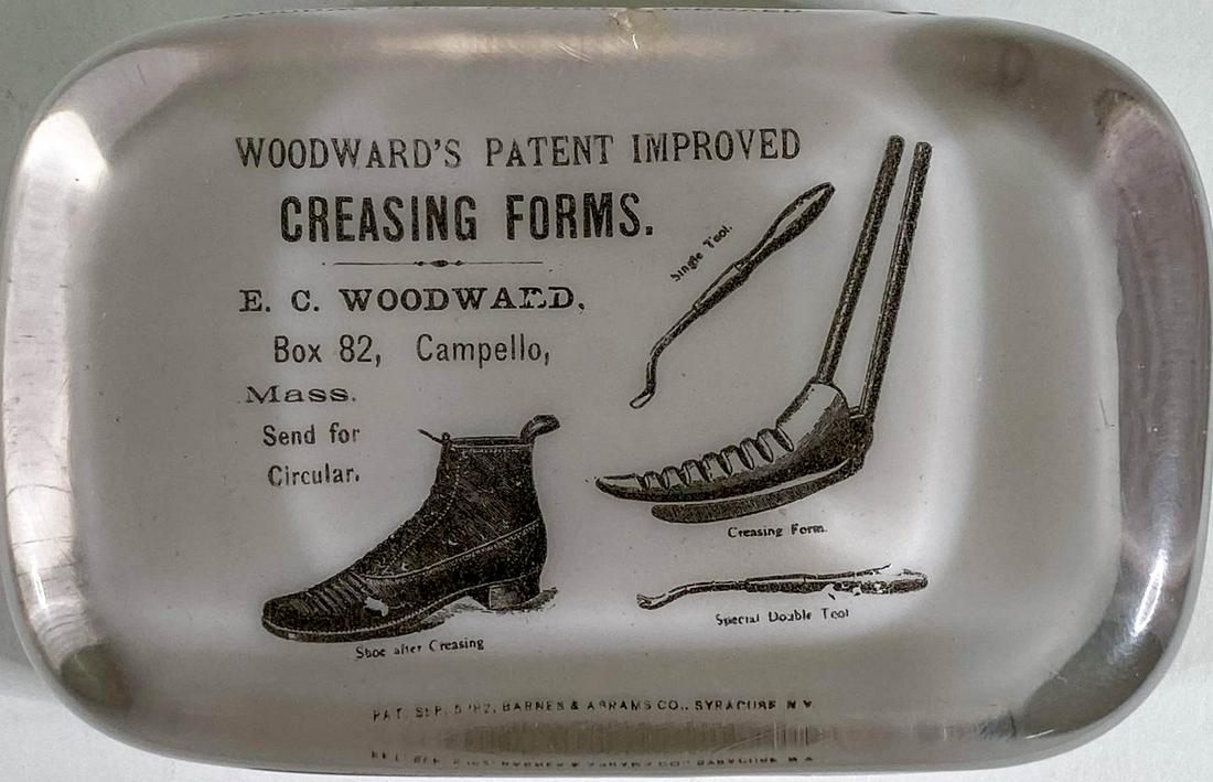 [Shoes, Boots] Woodward's Creasing Forms: [Shoes, Boots] Woodward's Creasing Forms (Campello, Massachusetts) Antique Advertising Glass Paperweight by Barnes & Abrams Paperweight Co. Syracuse, New York Measures 1 x 4 x 2.625 inches. There is o