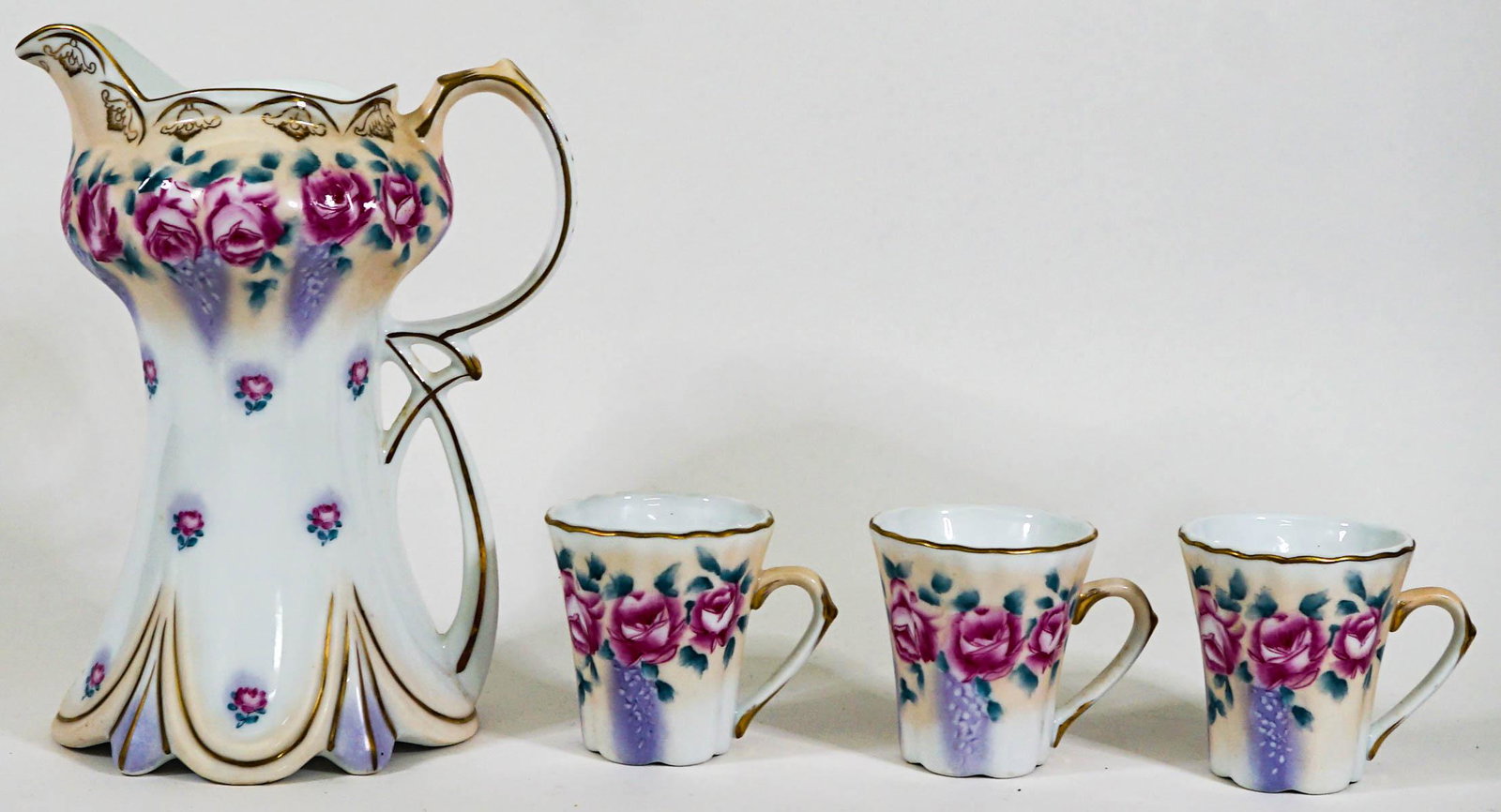 R. S. Teapot and (3) Cups: R S Teapot measures 9.25 in. tall (lacking lid) and (3) cups measure 3 in. tall. No evidence of damage or repair. If lot is absent of a condition report one may be requested via email. Condition repor