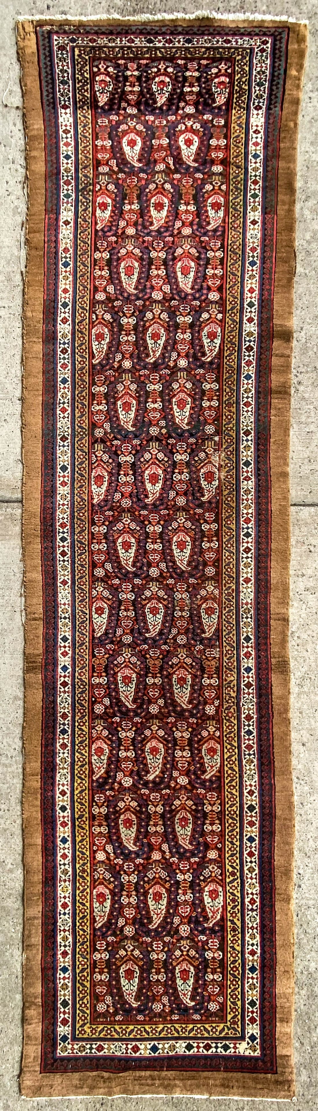 Rug Runner Measures 153.5 in x 37.5 in.: Rug Runner Measures 153.5 in x 37.5 in. As-is condition. Holes, fading and edge wear. If lot is absent of a condition report one may be requested via email. Condition report is provided as an opinion 