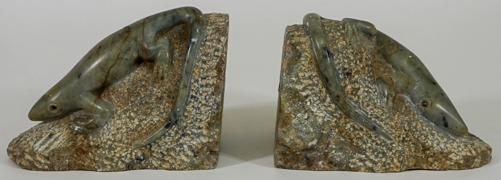 Artist Signed 'Salamandar' Bookends: Clever Chidarara signed bookends measure 6 in. tall. Provenance: Estate of David Milot. David was a Real Estate Broker by trade and a passionate, lifelong collector of anything of quality that caught 