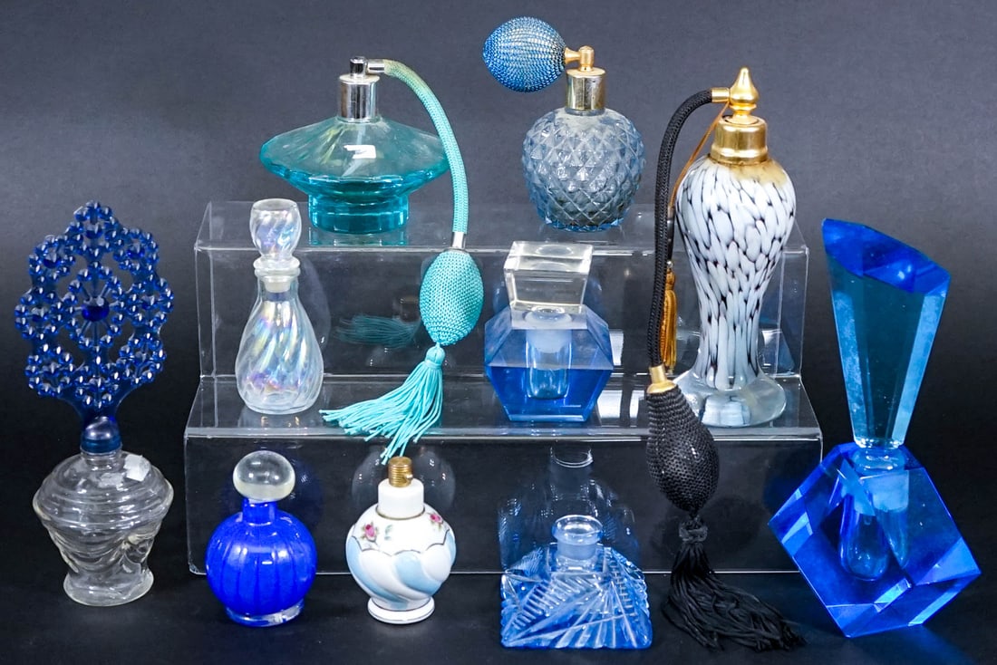 (10) Estate Lot Perfume Bottles Blue: (10) Estate lot of perfume bottles. Blue or blue accent. One bottle is missing its matching lid. As pictured. No evident damage or repairs. No addtl pictures available. If lot is absent of a condition