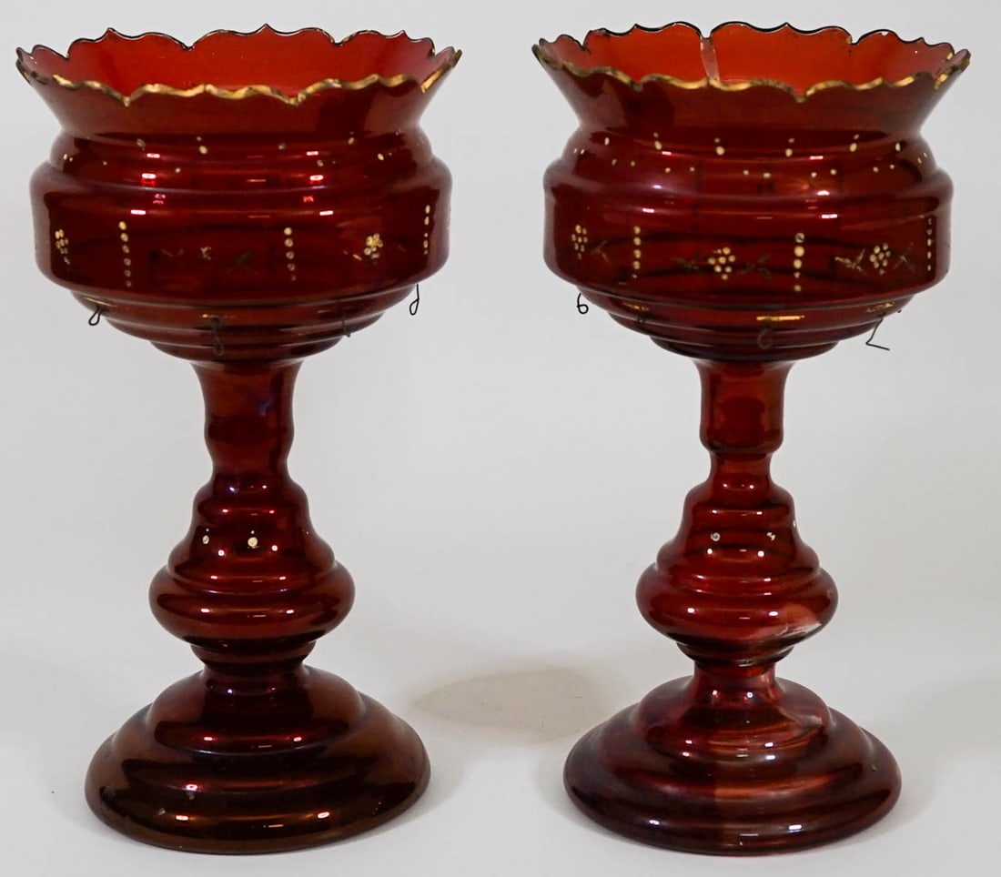 Pair Red and Gilt 10.75 IN Lusters [Lack Prisms]: Pair of red painted glass with gilt design 10.75 in. tall lusters (lacking prisms]. Small chips to top edge with some color and gilt loss. If lot is absent of a condition report one may be requested v