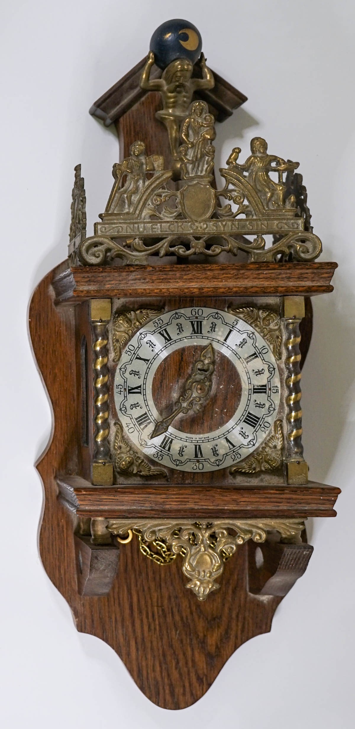 Vintage Wall Clock: Vintage wall clock. As-is condition. Measures 20 in. x 8 in. x 5 in. If lot is absent of a condition report one may be requested via email. Condition report is provided as an opinion only and is no gu