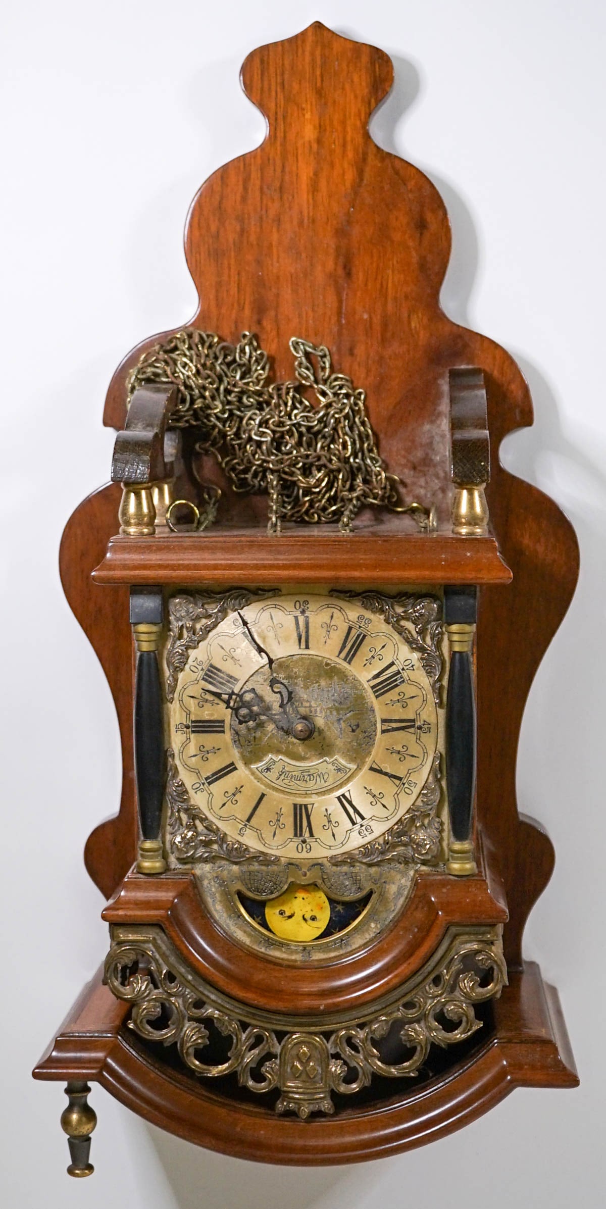 Vintage Wall Clock: Vintage wall clock. As-Is condition. Measures 19 in. x 9 in. x 6 in. If lot is absent of a condition report one may be requested via email. Condition report is provided as an opinion only and is no gu