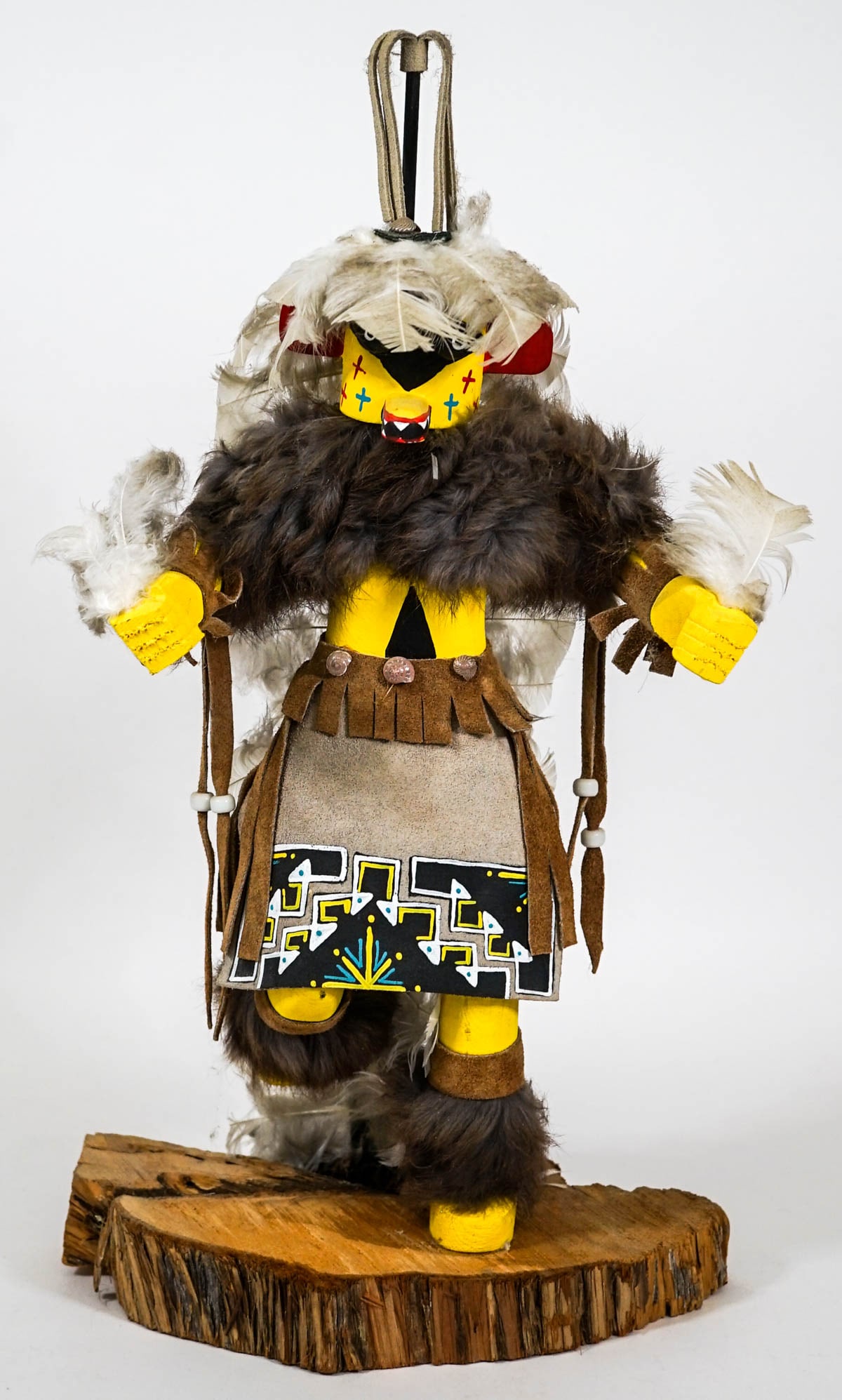 Kachina 17 IN Doll by Julia Largo: Kachina 17 in. tall doll signed Julia Largo underside of stand that measures 10 in. x 7 in. x 1.5 in. high. Total height with stand and headdress is 18.25 in. tall. No evidence of damage or repairs. P