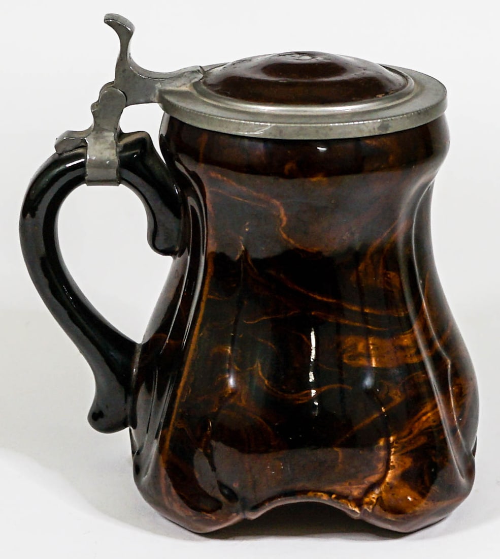 Villeroy and Bach #24 Stein: Villeroy and Bach stein measures 6 in. tall to top of handle. Heavy crazing inside with small chip to rim. If lot is absent of a condition report one may be requested via email. Condition report is pr