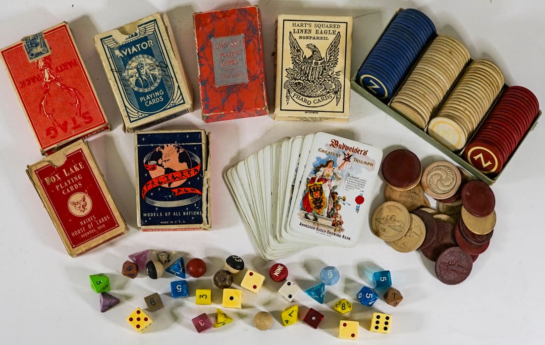 Vintage Poker Chips, Playing Cards and More: Lot of poker chips, playing cards (note Hart's Linen Eagle cards appear unplayed and 52 counted, Budweiser 52 counted, the other decks appear full and have not been counted), and more. Provenance: Mon