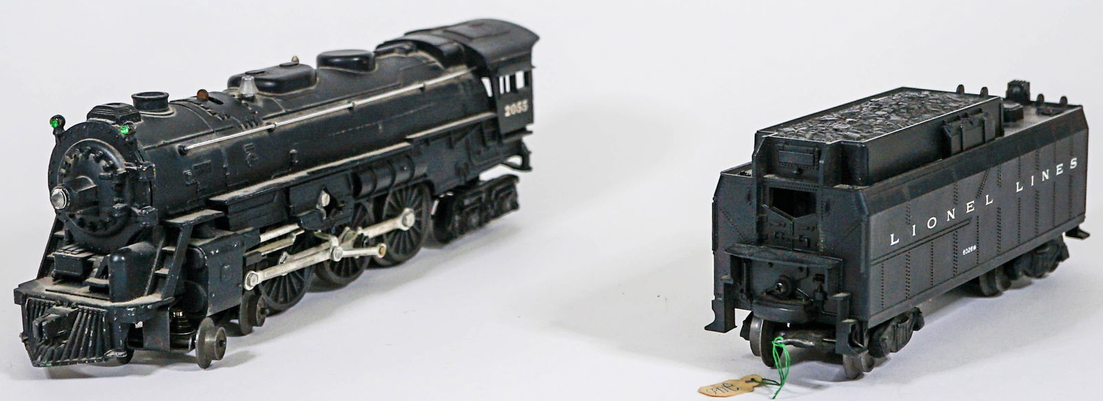 Lionel 2055 Engine & 6026W Tender: Lionel 2055 Engine & 6026W Tender. Provenance: Missoula, Montana Private Collection. Untested, from a lifelong collector who serviced and repaired trains requiring any attention. If lot is absent of a