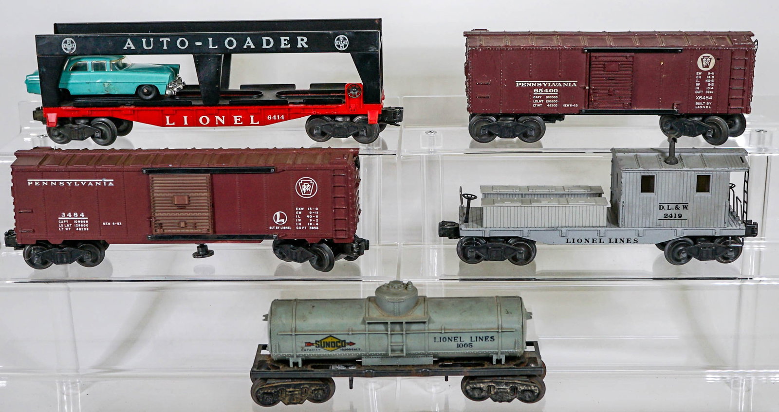 Lionel Trains (6): Lionel Trains (6). Provenance: Missoula, Montana Private Collection. Untested, from a lifelong collector who serviced and repaired trains requiring any attention. If lot is absent of a condition repor