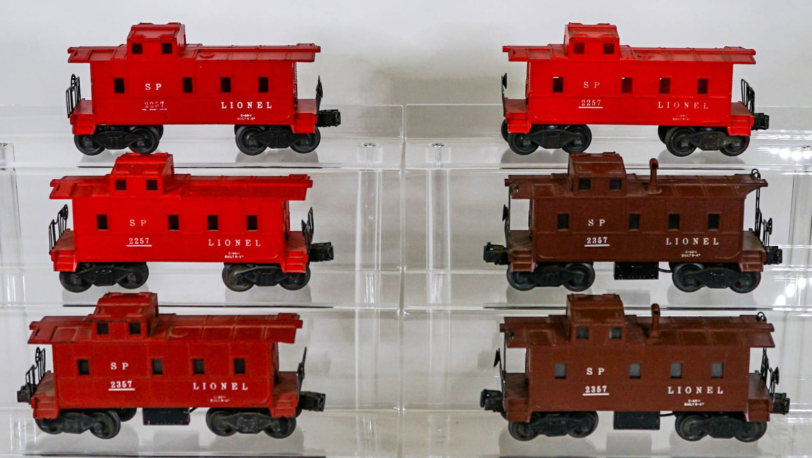 Lionel Cabooses 2357 & 2257: Lionel Cabooses 2357 & 2257. Provenance: Missoula, Montana Private Collection. Untested, from a lifelong collector who serviced and repaired trains requiring any attention. If lot is absent of a condi