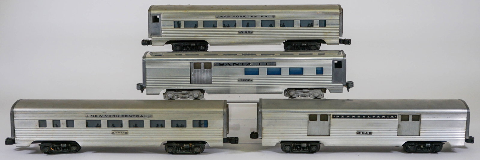 AMT Passenger Cars 5260 3160 4170 NYC Diner: AMT Passenger Cars 5260 3160 4170 NYC Diner. Provenance: Missoula, Montana Private Collection. Untested, from a lifelong collector who serviced and repaired trains requiring any attention. If lot is a
