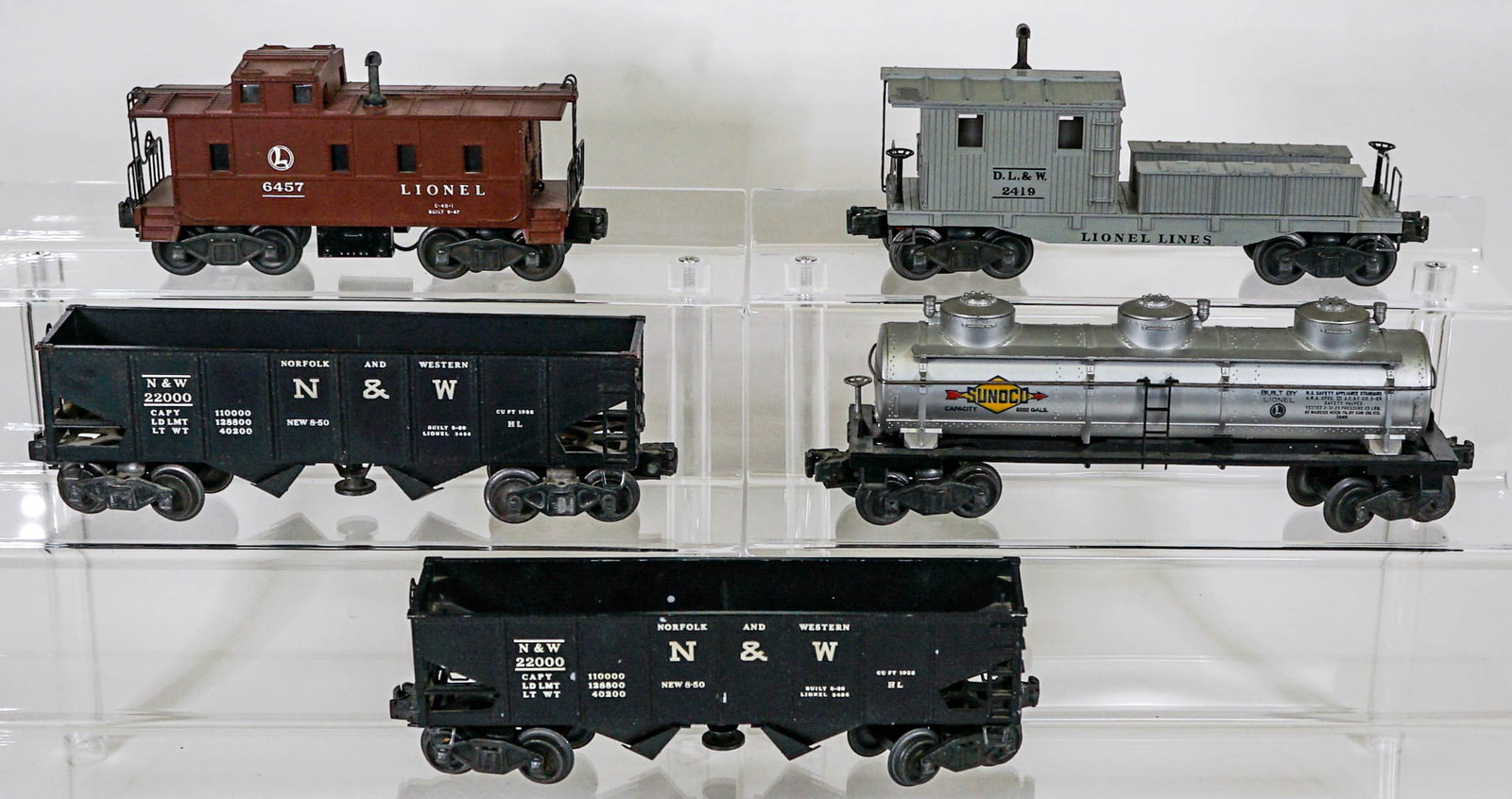 Lionel Trains (5): Lionel Trains (5). Provenance: Missoula, Montana Private Collection. Untested, from a lifelong collector who serviced and repaired trains requiring any attention. If lot is absent of a condition repor