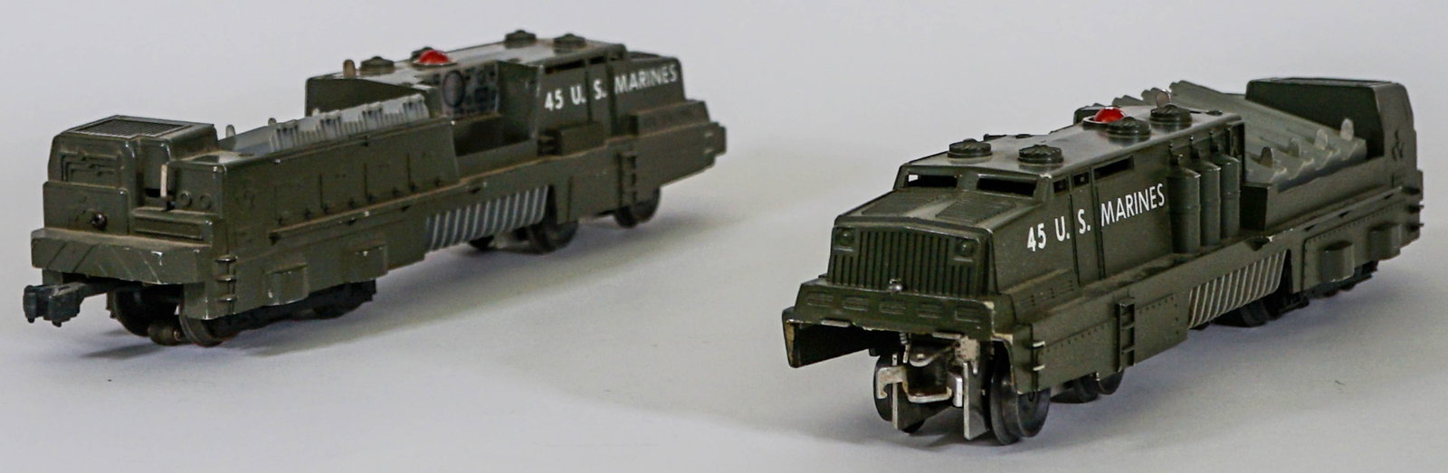 Lionel No. 45 U.S. Marines Mobile Launchers (2): Lionel No. 45 U.S. Marines Mobile Launchers (2). Provenance: Missoula, Montana Private Collection. Untested, from a lifelong collector who serviced and repaired trains requiring any attention. If lot 