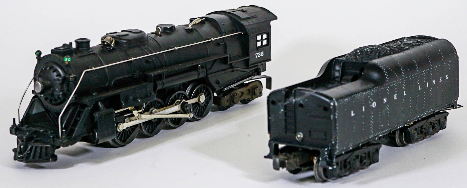 Lionel No. 736 Engine & 2671WX Tender: Lionel No. 736 Engine & 2671WX Tender. Provenance: Missoula, Montana Private Collection. Untested, from a lifelong collector who serviced and repaired trains requiring any attention. If lot is absent 
