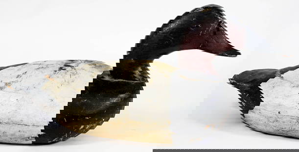 Large Vintage Carved Wood Duck Decoy: Large Vintage Carved Wood Duck Decoy. Measures 9 x 18.5 x 7 inches. If lot is absent of a condition report one may be requested via email. Condition report is provided as an opinion only and is no gua