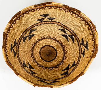 Native American Basket: Native American basket. Measures 4 x 12 inches. If lot is absent of a condition report one may be requested via email. Condition report is provided as an opinion only and is no guarantee as condition