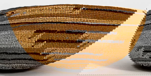 Native American Basket: Native American basket. Measures 3.5 x 7.5 inches. If lot is absent of a condition report one may be requested via email. Condition report is provided as an opinion only and is no guarantee as conditi