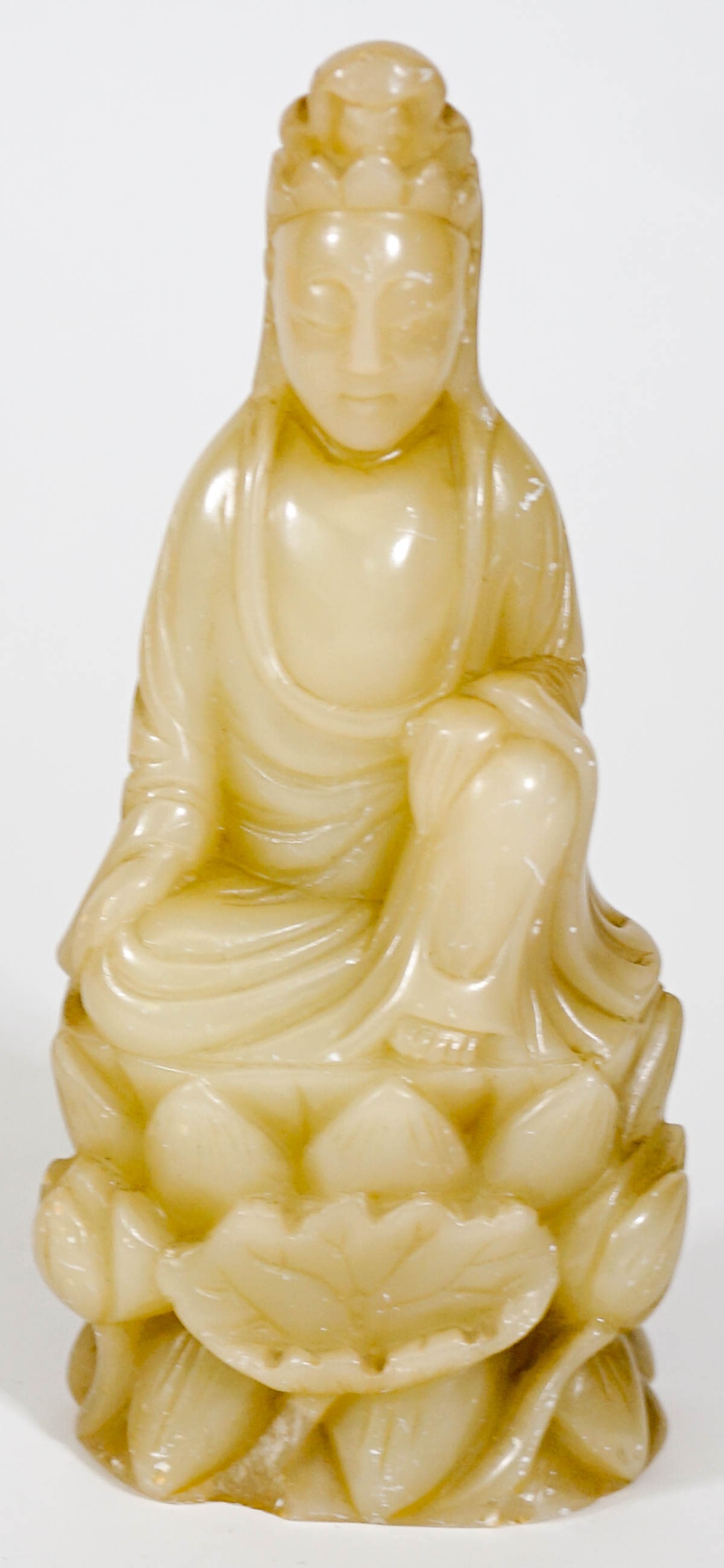 White Jade Quan Yin Carved Figure: White Jade Quan Yin Carved Figure. Measures 6.625 inches tall x 3 x 1.75 inches. There are some tiny nicks, scuffs and/or scratches. If lot is absent of a condition report one may be requested via ema