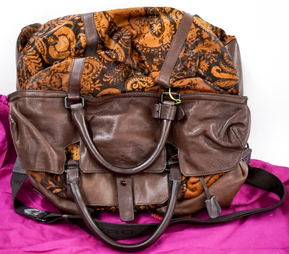 Authentic Etro Large Carry or Tote Bag: Authentic Etro Large Carry or Tote Bag. Measures 20 inches x 16 inches. Like-new. If lot is absent of a condition report one may be requested via email. Condition report is provided as an opinion only